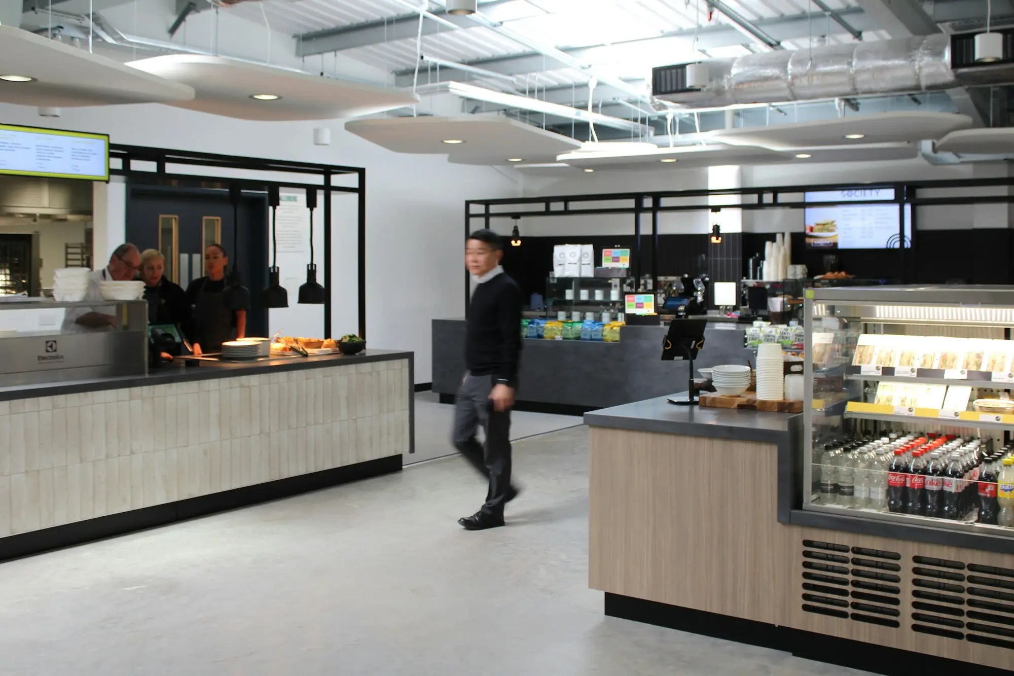 Café service counter with a refrigerated drinks and food display that needs protecting during a summer heatwave